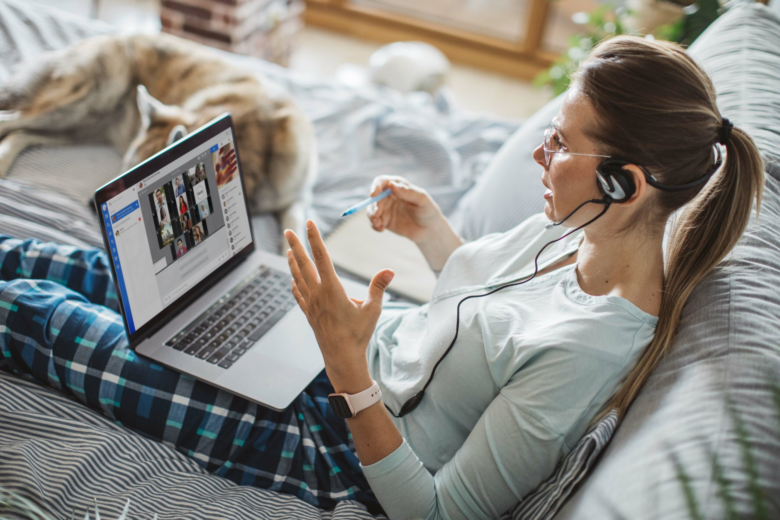 GettyImages-1252488451-lady-pyjamas-earphones-rainbow-classic-multitenant-conference-call-ultrahd-6720x4480